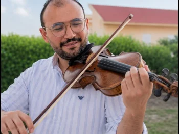 تدريب اولى على الة الكمان